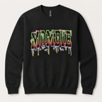 A black crewneck sweatshirt featuring a colorful 'MOMBIE' graphic on the chest in a dripping, layered style with green, red, and yellow tones, set against a light beige background.