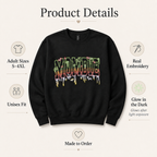 A black crewneck sweatshirt with a colorful 'MORBIT' graffiti-style graphic on the chest, presented on a light beige background with product feature callouts and text.