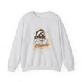 A light heather gray crewneck sweatshirt featuring a cartoon illustration of a Black man dressed as Santa Claus with a white beard, green hat, and the word 'Believe' written below in orange script.