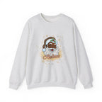 A light heather gray crewneck sweatshirt featuring a cartoon illustration of a Black man dressed as Santa Claus with a white beard, green hat, and the word 'Believe' written below in orange script.